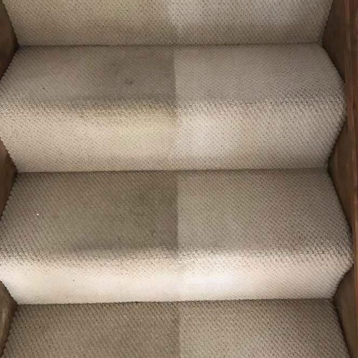 Stair carpet damage before repair